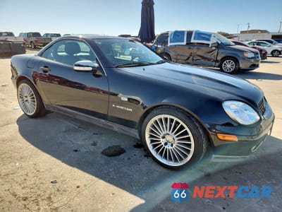 Czwarte zdjęcie samochodu z boku: 1999 MERCEDES-BENZ SLK 230 KOMPRESSOR VIN:WDBKK47F7XF132067 - miniatura