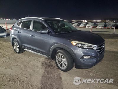 Czwarte zdjęcie samochodu z boku: 2017 HYUNDAI TUCSON LIMITED VIN:KM8J33A49HU562722 - miniatura