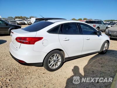 Trzecie zdjęcie samochodu z tyłu: 2017 FORD FOCUS SE VIN:1FADP3F22HL210249 - miniatura