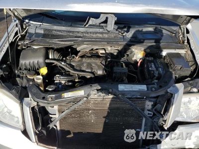 Zdjęcie 12 z 14 samochodu: 2010 DODGE GRAND CARAVAN SXT VIN:2D4RN5D1XAR445218 - miniatura