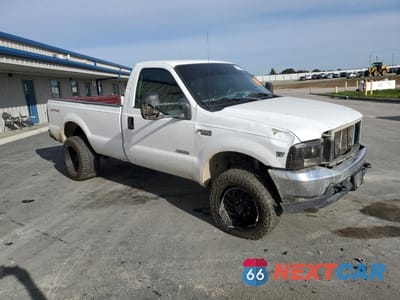 Czwarte zdjęcie samochodu z boku: 1999 FORD F250 SUPER DUTY VIN:1FTNF21F0XEB86753 - miniatura