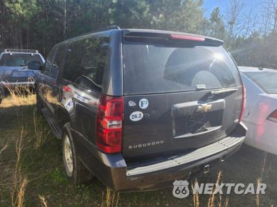 Trzecie zdjęcie samochodu z tyłu: 2010 CHEVROLET SUBURBAN K1500 LS VIN:1GNUKHE32AR291666 - miniatura