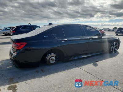 Trzecie zdjęcie samochodu z tyłu: 2017 BMW 740 XE VIN:WBA7J2C39HG497790 - miniatura
