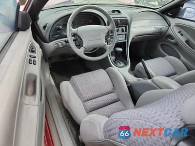 Zdjęcie 8 z 12 samochodu: 1997 FORD MUSTANG GT VIN:1FALP42X1VF129935 - miniatura