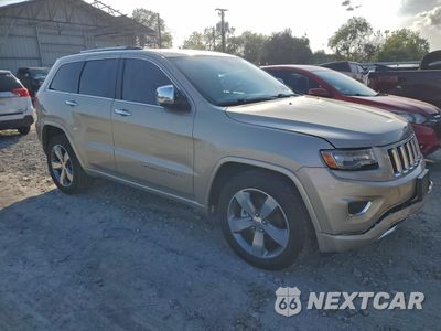 Czwarte zdjęcie samochodu z boku: 2014 JEEP GRAND CHEROKEE OVERLAND VIN:1C4RJECT2EC149099 - miniatura