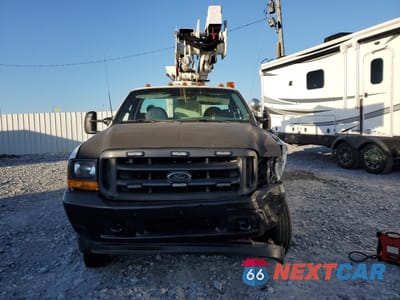 Piąte zdjęcie samochodu w środku: 1999 FORD F450 SUPER DUTY BUCKET TRUCK VIN:1FDXF46FXXEE74790 - miniatura