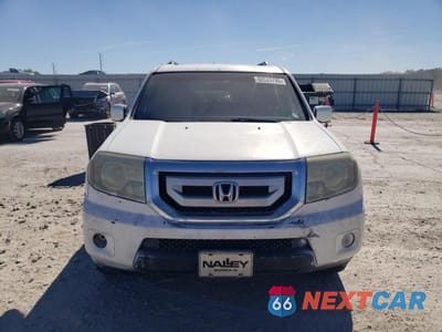 Piąte zdjęcie samochodu w środku: 2011 HONDA PILOT EX VIN:5FNYF3H4XBB033683 - miniatura