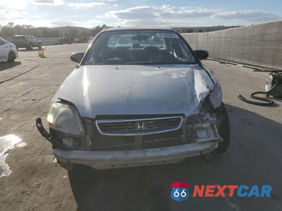 Piąte zdjęcie samochodu w środku: 1996 HONDA CIVIC LX VIN:2HGEJ6679TH521892 - miniatura