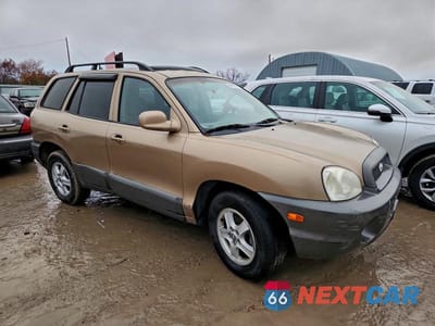 Czwarte zdjęcie samochodu z boku: 2004 HYUNDAI SANTA FE VIN:KM8SC13D84U570097 - miniatura