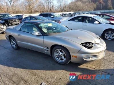 Czwarte zdjęcie samochodu z boku: 2001 PONTIAC FIREBIRD FORMULA VIN:2G2FV22G812146703 - miniatura