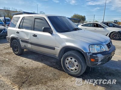 Czwarte zdjęcie samochodu z boku: 1999 HONDA CR-V LX VIN:JHLRD1744XC023691 - miniatura
