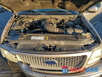 Zdjęcie 11 z 12 samochodu: 2002 FORD F150 VIN:2FTRX18W32CA70637 - miniatura
