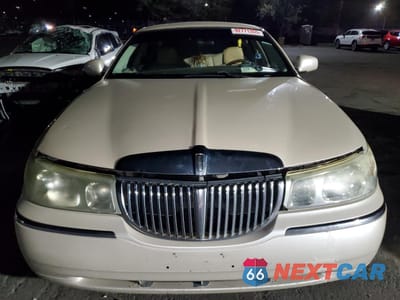 Piąte zdjęcie samochodu w środku: 1999 LINCOLN TOWN CAR CARTIER VIN:1LNHM83W7XY691721 - miniatura