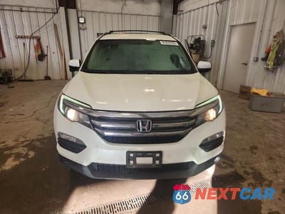 Piąte zdjęcie samochodu w środku: 2016 HONDA PILOT EX VIN:5FNYF6H36GB045538 - miniatura
