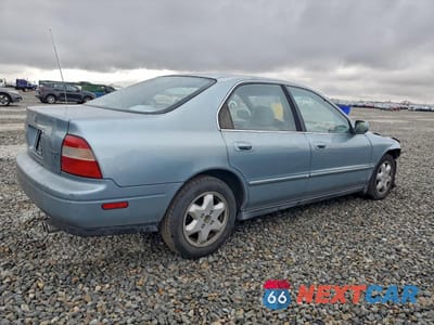 Trzecie zdjęcie samochodu z tyłu: 1995 HONDA ACCORD EX VIN:1HGCE6664SA031750 - miniatura