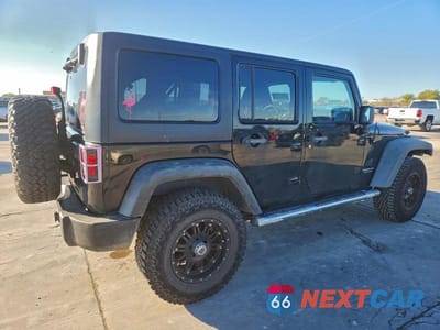 Trzecie zdjęcie samochodu z tyłu: 2011 JEEP WRANGLER UNLIMITED RUBICON VIN:1J4BA6H13BL580118 - miniatura