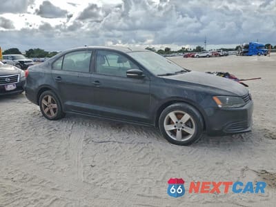 Czwarte zdjęcie samochodu z boku: 2011 VOLKSWAGEN JETTA TDI VIN:3VWLL7AJ0BM033033 - miniatura