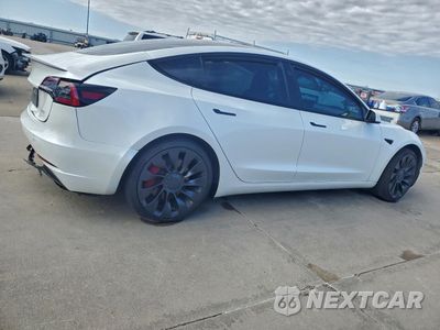 Trzecie zdjęcie samochodu z tyłu: 2023 TESLA MODEL 3 VIN:5YJ3E1EC6PF619804 - miniatura