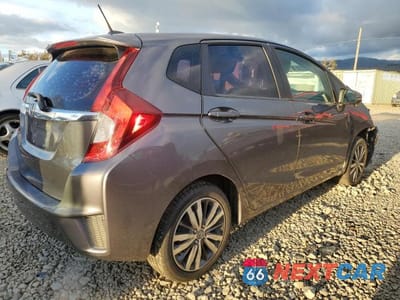 Trzecie zdjęcie samochodu z tyłu: 2015 HONDA FIT EX VIN:3HGGK5H88FM740127 - miniatura