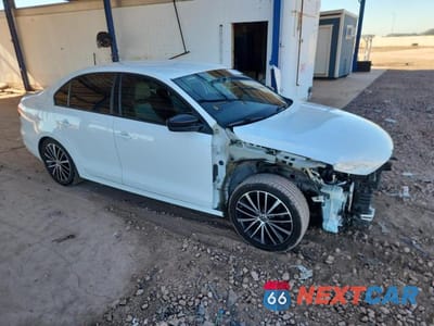 Czwarte zdjęcie samochodu z boku: 2016 VOLKSWAGEN JETTA SPORT VIN:3VWD17AJ3GM278264 - miniatura