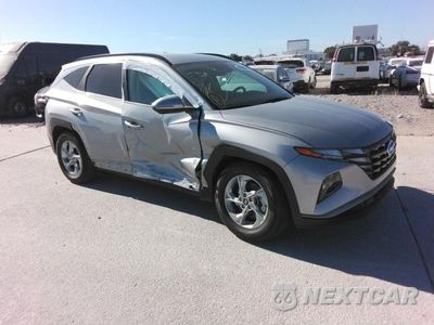 Czwarte zdjęcie samochodu z boku: 2022 HYUNDAI TUCSON SEL VIN:KM8JB3AE9NU034282 - miniatura