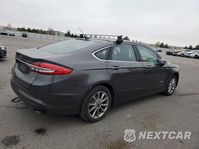 Trzecie zdjęcie samochodu z tyłu: 2018 FORD FUSION SE PHEV VIN:3FA6P0PU5JR145153 - miniatura
