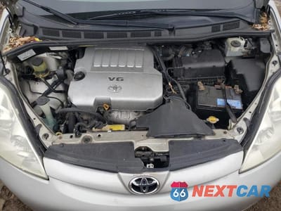 Zdjęcie 12 z 13 samochodu: 2010 TOYOTA SIENNA XLE VIN:5TDYK4CC3AS316002 - miniatura