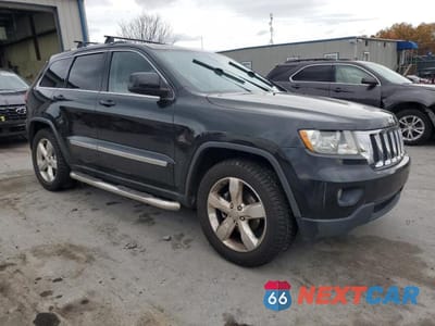 Czwarte zdjęcie samochodu z boku: 2011 JEEP GRAND CHEROKEE LAREDO VIN:1J4RR4GG4BC567279 - miniatura