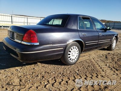 Trzecie zdjęcie samochodu z tyłu: 1999 FORD CROWN VICTORIA VIN:2FAFP73W3XX135635 - miniatura