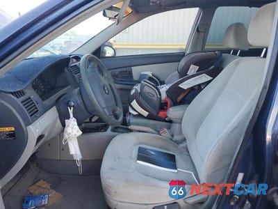 Zdjęcie 7 z 11 samochodu: 2004 KIA SPECTRA LX VIN:KNAFE122745052456 - miniatura