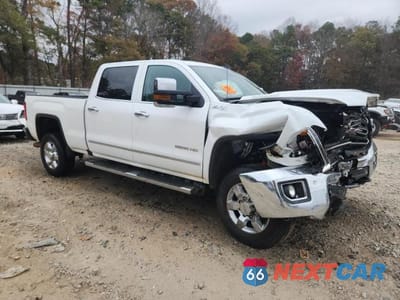 Czwarte zdjęcie samochodu z boku: 2019 GMC SIERRA K2500 SLT VIN:1GT12REY6KF114389 - miniatura
