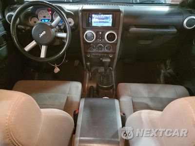 Zdjęcie 8 z 13 samochodu: 2008 JEEP WRANGLER UNLIMITED SAHARA VIN:1J4GA59158L641864 - miniatura