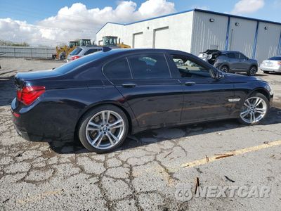 Trzecie zdjęcie samochodu z tyłu: 2014 BMW 750 I VIN:WBAYA8C55ED825308 - miniatura