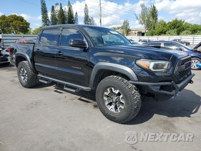 Czwarte zdjęcie samochodu z boku: 2017 TOYOTA TACOMA DOUBLE CAB VIN:5TFCZ5AN5HX076133 - miniatura