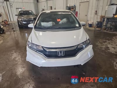 Piąte zdjęcie samochodu w środku: 2019 HONDA FIT SPORT VIN:3HGGK5H66KM723173 - miniatura