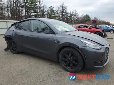 Czwarte zdjęcie samochodu z boku: 2022 TESLA MODEL Y VIN:7SAYGDEE0NF401683 - miniatura