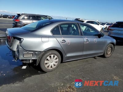 Trzecie zdjęcie samochodu z tyłu: 2016 VOLKSWAGEN JETTA S VIN:3VW267AJ5GM343835 - miniatura