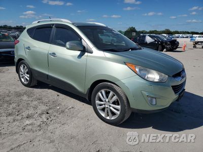 Czwarte zdjęcie samochodu z boku: 2010 HYUNDAI TUCSON GLS VIN:KM8JUCAC7AU061936 - miniatura