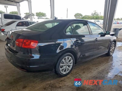 Trzecie zdjęcie samochodu z tyłu: 2011 VOLKSWAGEN JETTA SE VIN:3VWDX7AJ6BM120332 - miniatura