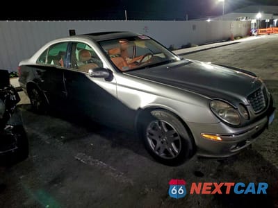 Czwarte zdjęcie samochodu z boku: 2005 MERCEDES-BENZ E 320 VIN:WDBUF65J15A641128 - miniatura