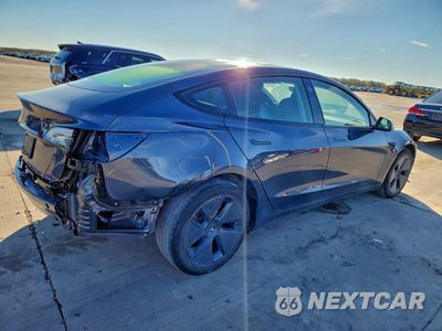Trzecie zdjęcie samochodu z tyłu: 2023 TESLA MODEL 3 VIN:5YJ3E1EA4PF655716 - miniatura