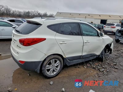Trzecie zdjęcie samochodu z tyłu: 2010 HYUNDAI TUCSON GLS VIN:KM8JUCAC6AU080462 - miniatura