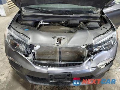 Zdjęcie 12 z 13 samochodu: 2018 HONDA PILOT EXL VIN:5FNYF6H56JB028344 - miniatura