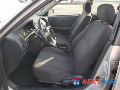 Zdjęcie 7 z 11 samochodu: 2002 TOYOTA COROLLA CE VIN:1NXBR12E02Z644120 - miniatura