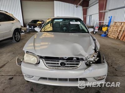 Piąte zdjęcie samochodu w środku: 2002 TOYOTA COROLLA CE VIN:2T1BR12E42C552221 - miniatura