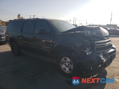 Czwarte zdjęcie samochodu z boku: 2012 CHEVROLET SUBURBAN C1500 LT VIN:1GNSCJE02CR268960 - miniatura