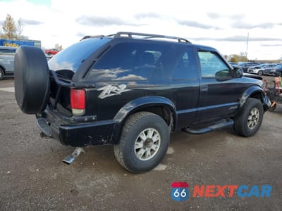 Trzecie zdjęcie samochodu z tyłu: 2005 GMC JIMMY SLS VIN:1GKCT18X45K104020 - miniatura