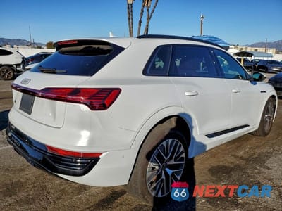 Trzecie zdjęcie samochodu z tyłu: 2024 AUDI Q8 E-TRON PRESTIGE VIN:WA16AAGE7RB016268 - miniatura