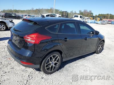 Trzecie zdjęcie samochodu z tyłu: 2017 FORD FOCUS SEL VIN:1FADP3M25HL239120 - miniatura