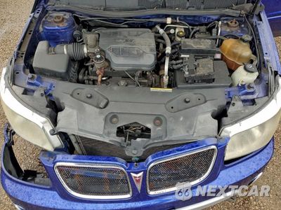 Zdjęcie 11 z 12 samochodu: 2006 PONTIAC TORRENT VIN:2CKDL63F366028007 - miniatura